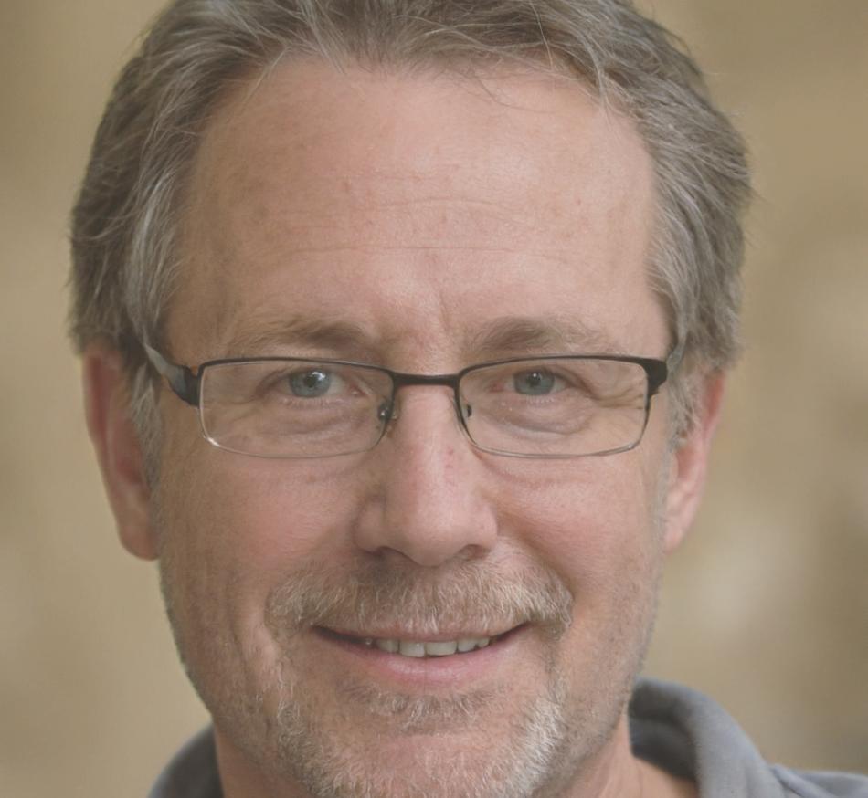 Professional headshot of program graduate